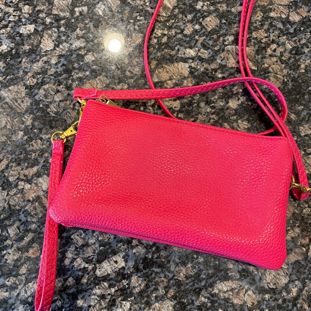 Like brand new accordion Pink Wristlet or crossbody!